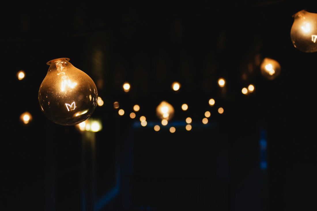 String lights in a dark room, no person