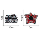 Set of 2 pins Stranger Things alphabet and Demogorgon