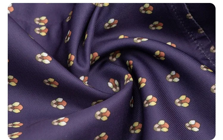 Patterned purple fabric of the Holly Wheeler costume jumpsuit