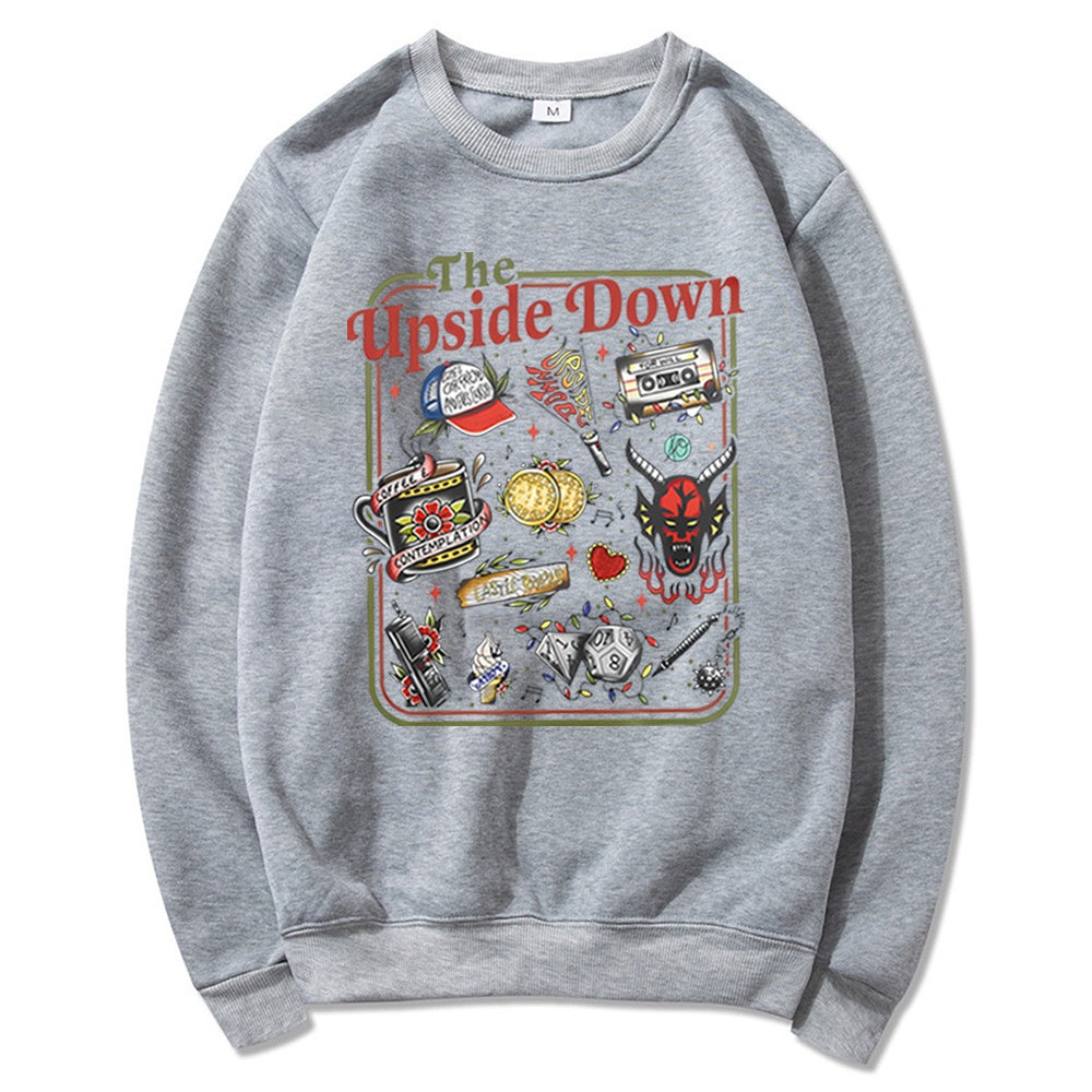 Stranger Things crewneck sweatshirt The Upside Down cult objects heather gray, objects from the show as retro tattoos on the front