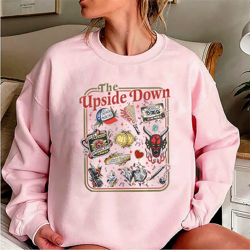 Stranger Things crewneck sweatshirt The Upside Down cult objects pink, objects from the show as retro tattoos on the front